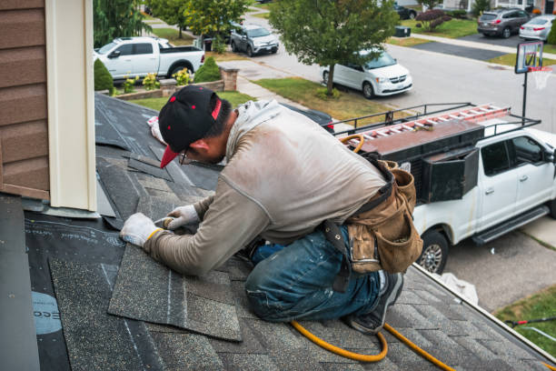 Professional Roofing technician working in Levasy, MO